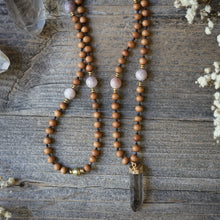 Load image into Gallery viewer, mother wound mala to ground