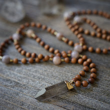 Load image into Gallery viewer, mother wound mala to ground