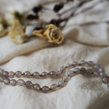 Load image into Gallery viewer, we hold it loosely