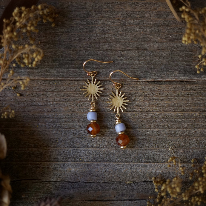 totem earrings: expansive