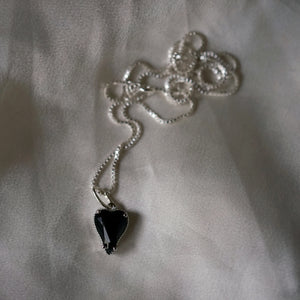 black heart in silver