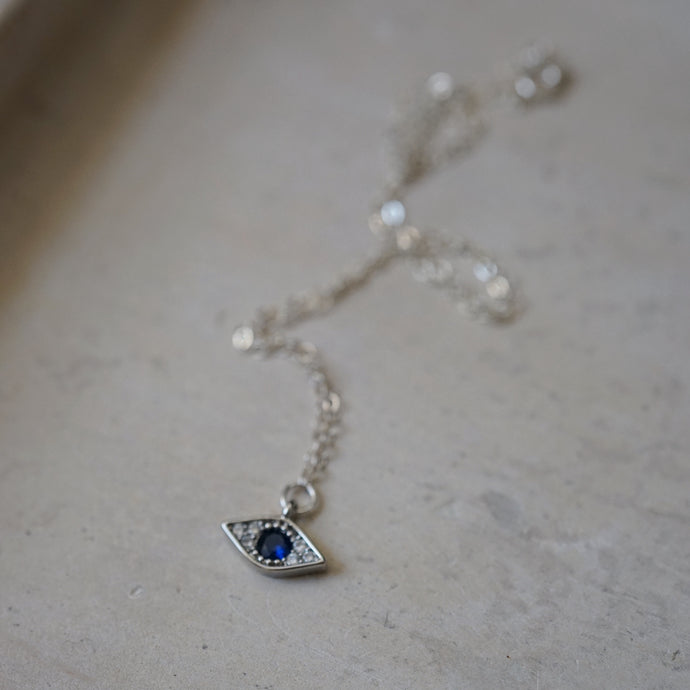 sapphire + silver eye talisman