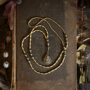 pyrite + buddha brass necklace