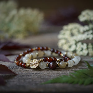 garnet + rutilated quartz bracelet