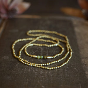 brass + green garnet