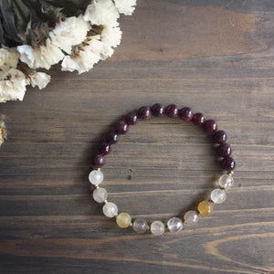 rutilated quartz + garnet