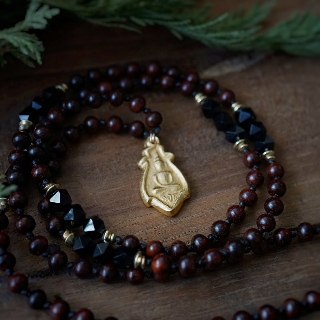 golden buddha mala