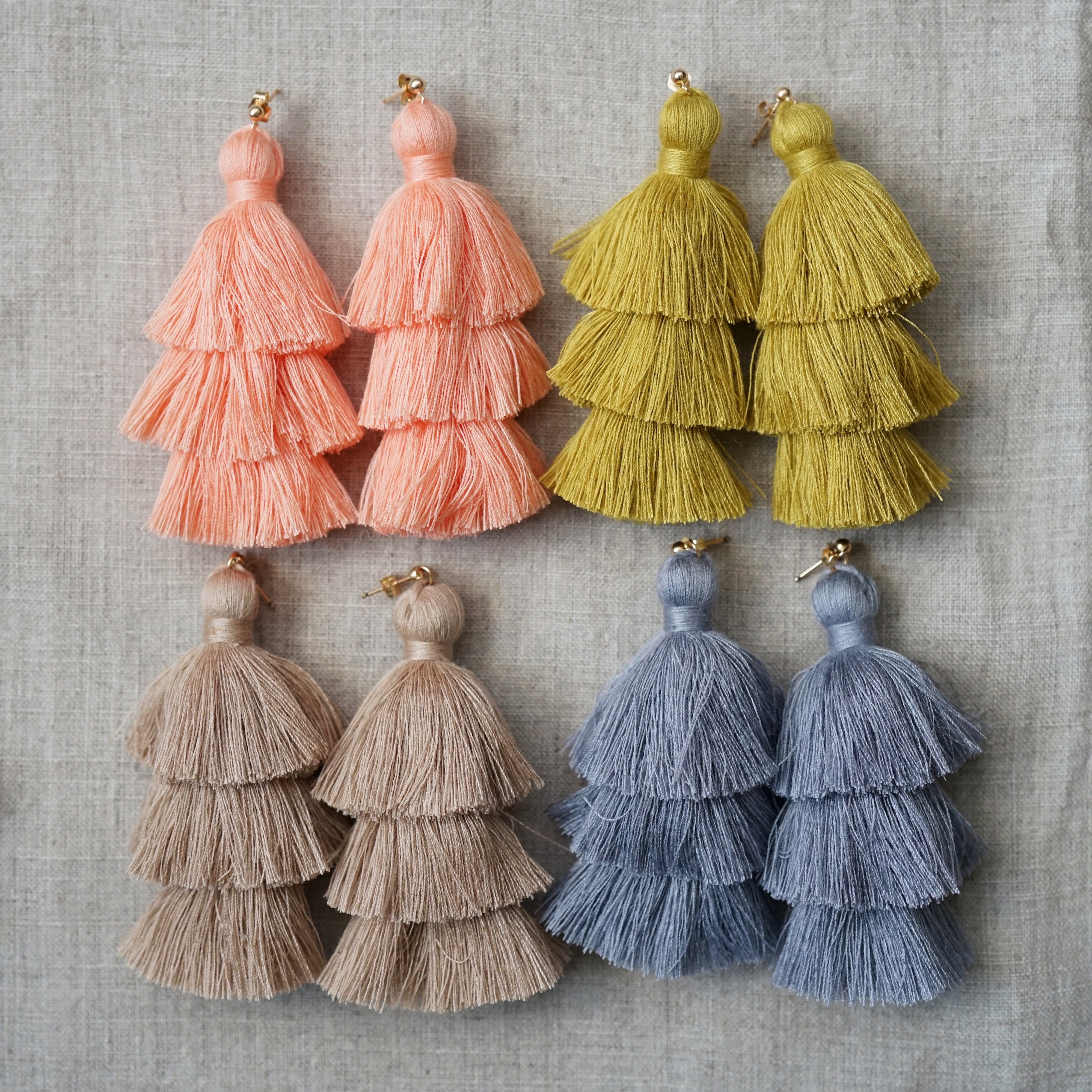 Triple tassel best sale earrings