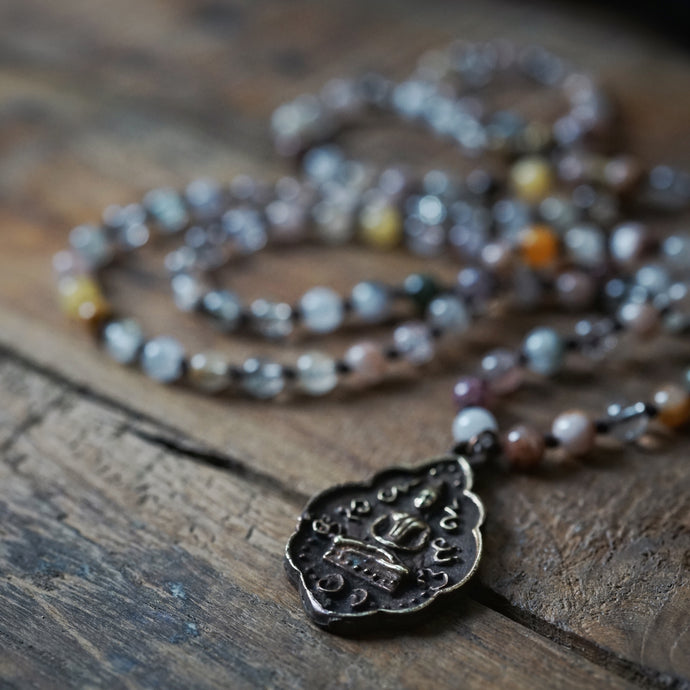 multi rutile quartz + buddha mala