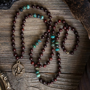 ganesh on an azurite + rosewood mala