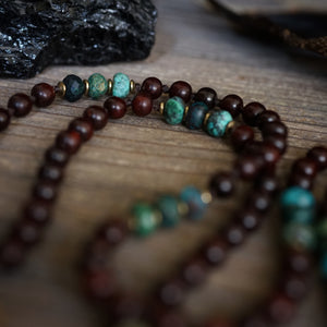 ganesh on an azurite + rosewood mala