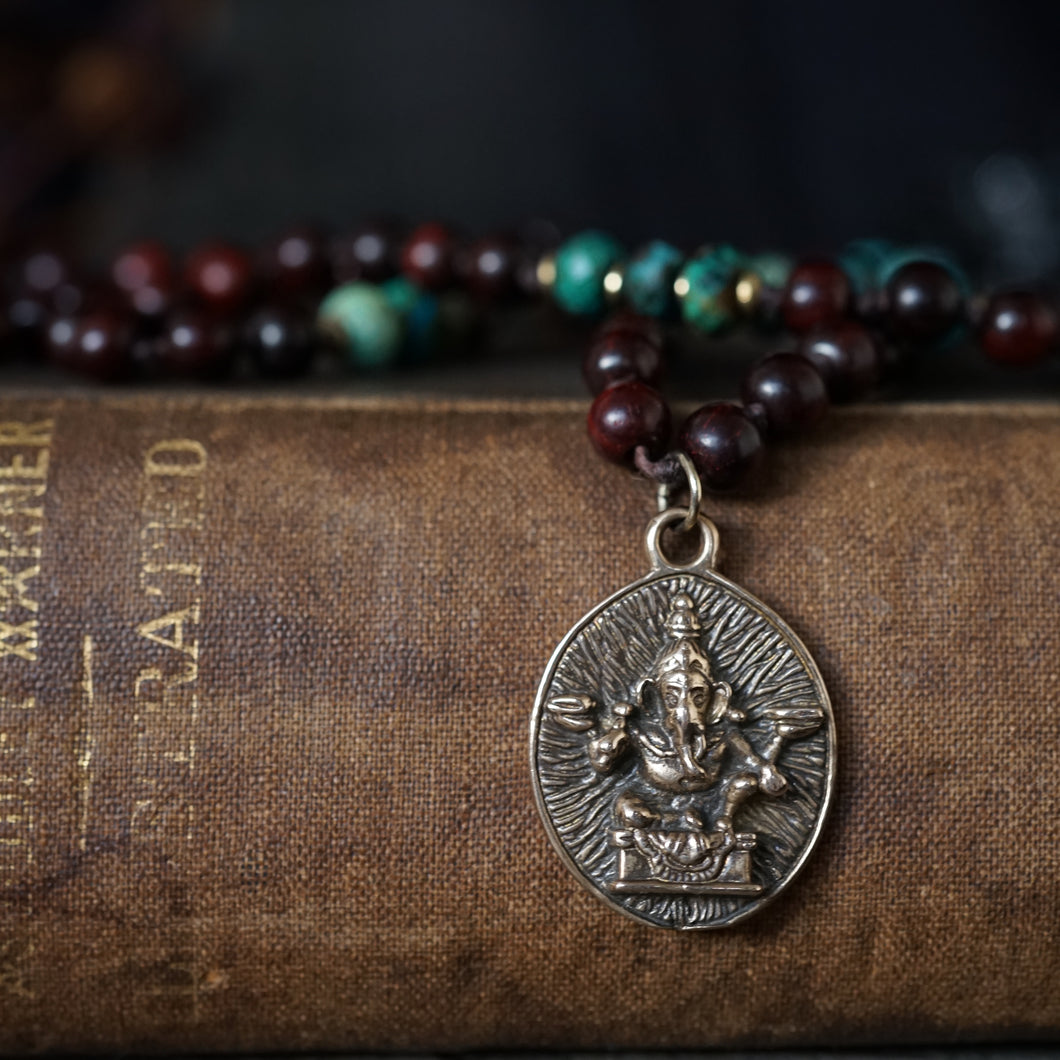 ganesh on an azurite + rosewood mala